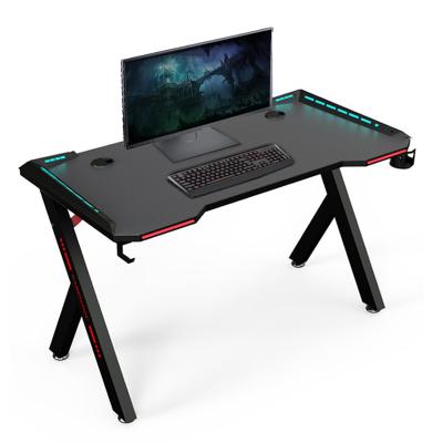 China Custom Foldable LED RGB Gaming Desks Black PC Computer Racing Table Home Office Computer Desk for sale