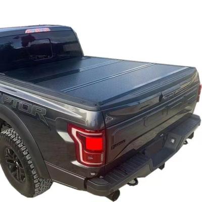 China Tonneau Cover Aluminum Hard Triple Foldaway Bedspread For Dodge Ram 1500 Ford F150 GMC Sierra Toyota Hilux for sale