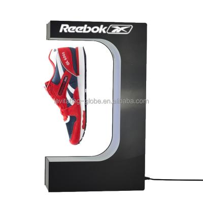 China The shoe is floating and rotating in air advertiseing acrylic floating shoe display stand for sale