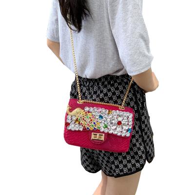 China Fashion Lady 2022 Python Diamond Bags Stain Girl and Purses Women Snake Leather Chain Bags with Peacock Crystal Handbags for sale