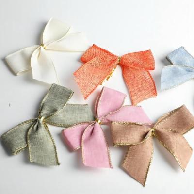 China Mini Solid Color Ribbon Bow Artificial Wholesale Custom Decoration Polyester Monochromatic Christmas Bows for sale