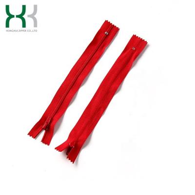 China Hot Sale Custom Auto Lock 3# Plugged Plastic Red Nylon Zipper Pull for sale