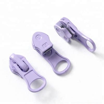 China Other Wholesale Eco Friendly Cheap Price Knocked Down Nylon Thumb Puller Zipper Slider for sale