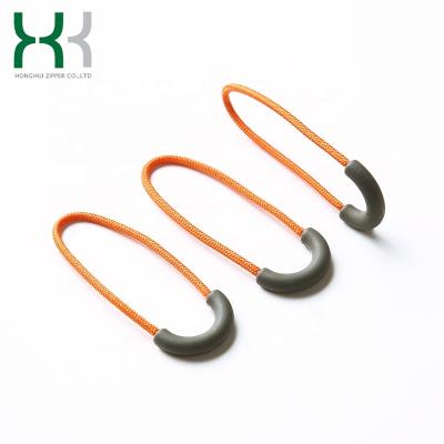 China Custom Brand Nickel Free Logo Plastic Rubber Bag Zipper Puller Cheap Fashion Fancy Popular for sale