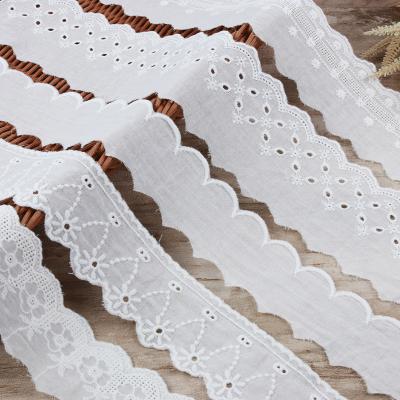 China Viable Wholesale Fashion Hollow High Quality White Embroidery Lace Trimmings For Wedding Dresses for sale