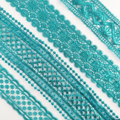 China Sustainable 2023 New Designs Crochet Embroidery Decorate Lace Sequin Multi Color Guipure Lace Trim for sale