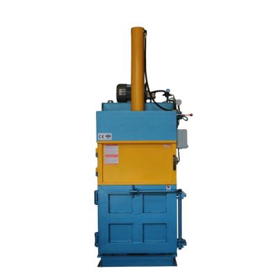 China Hydraulic Vertical Ardboard PET Bottle Plastic Film Waste Paper Baler Machine for sale