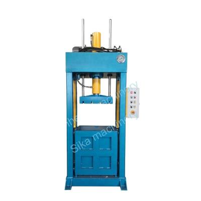 China Textiles Box Used Clothing Press Machine Hydraulic Vertical Lifting Press Machine for sale