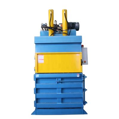 China CLOTHING Double Cylinders Vertical Waste Paper Cardboard Baler Machine for sale