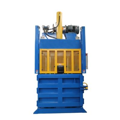 China Electric Vertical Hydraulic Waste Paper Carton Plastic Sheet Door Cardboard Plastic Sheet Baler Lifter Machine for sale