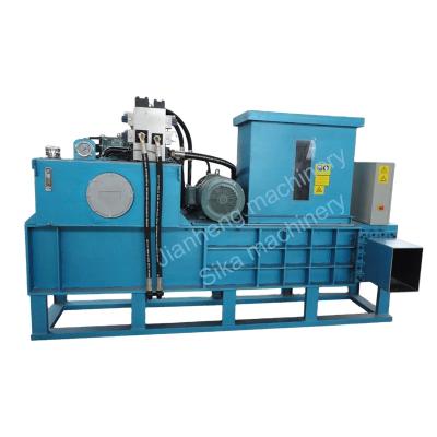 China Automatic hydraulic horizontal sawdust wood shavings rice husk rice husk press machine horizontal bagging machine for sale