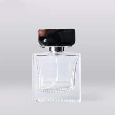 China RS 100ml Custom OEM Rectangle Glass Transparent Perfume Bottles With Black Cap for sale