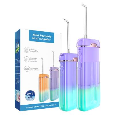 China 2021 New Arrival Oral Health Portable Waterproof Usb Gradient Color Dental Rechargeable Water Flosser Effectively Holds For E-commerce Platform for sale