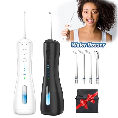 China 360 Rated Teeth Wireless Oral Water Flosser Jet Irrigator Pick Dental Floss Spout and Toothbrush Household for sale