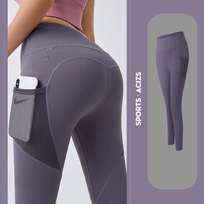 China Breathable Hot Style High Waist Outside Net Pocket Yoga Pants Running Driving Four Way Yoga Popular Stretch Legging for sale