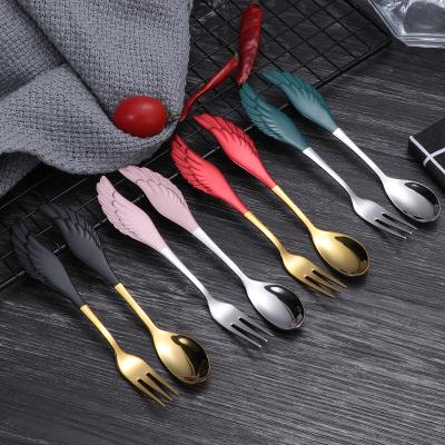 China Durable 304 Stainless Steel Wing Shaped Golden Teaspoon Dessert Three-tooth Spoon for sale