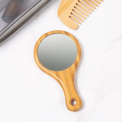 China Portable Wholesale Magnifying Natural Wooden Bamboo Handle Around Beauty Salon Makeup Mirror for sale