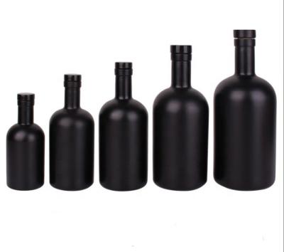 China Beverage Matte black 700ml 750ml vodka glass bottle wholesale price 500ml whisky gin spirit glass liquor bottle with cork for sale