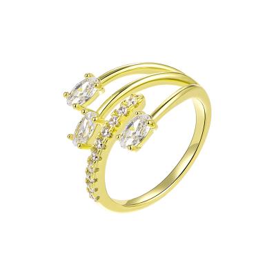 China Environmentally Friendly Streamline Ring Female Three Prong Zircon Inlaid 14k Gold Open Ring for sale