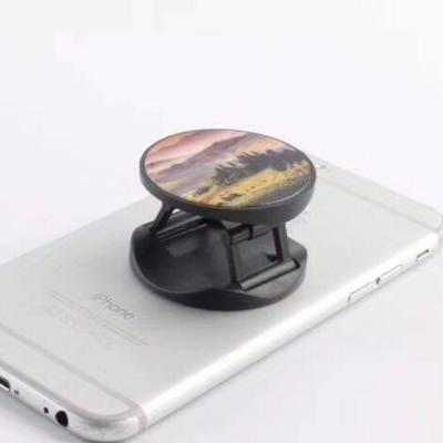 China High Quality Anti-corrosion Round Shape Mobile Phone Advertising Stand, Plastic Folding Mobile Phone Stand With Card Packing for sale