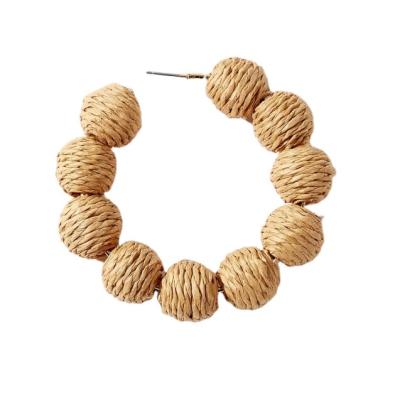 China BOHEMIA Raffia Trends Retro Hollow Designer Earrings Stud Earrings Cane Western Style Circle Fashion Factory Hyperbole Earrings Wholesale for sale