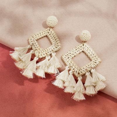 China Geometric BOHEMIA Bohemian Rattan With Handmade Retro Fabric Tassel Straw Woven Bamboo Spill Protector Earrings For Women Jewelry for sale