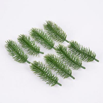 China Amazon Hot Selling Artificial Plastic Christmas Tree Pine Needle PE Branch Selection for sale