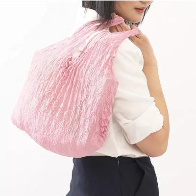 China Foldable Handheld Pleated Bag Mini Magic Pleated Stretch Bag Reusable Buyer/Customer Supermarket Large Capacity Storage Bag WEIBU for sale