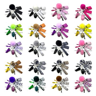 China Factory Hot Selling WEIBU Alarm Promotion Multi Color Bracelet Self-defense Tassel Key Chain Set For Women for sale