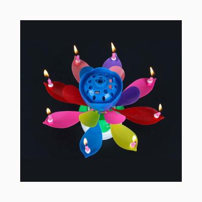 China The best-selling rotating lotus cake is decorated with unfolding interesting music candles for sale