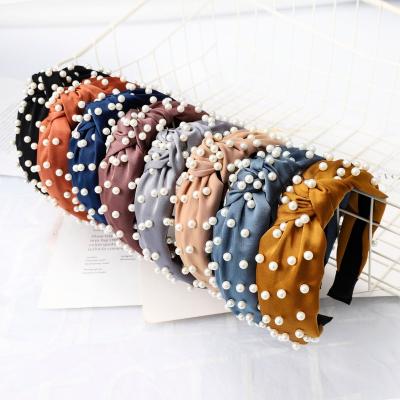 China Wholesale Fashion Hair Band Fashion Temperament Headband Hair Accessories Knot Artificial Girl Twisted Pearl Headband For Girls for sale