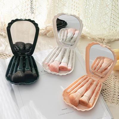 China Mini Hot selling portable mini 5 in 1 cosmetic mirror and makeup set brush with shell shaped plastic case for sale