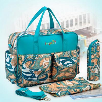 China Water Resistant Fashion Printed Turquoise Diaper Bags Fancy Handbags Paragliding Mommy Changing Diaper Bag for sale