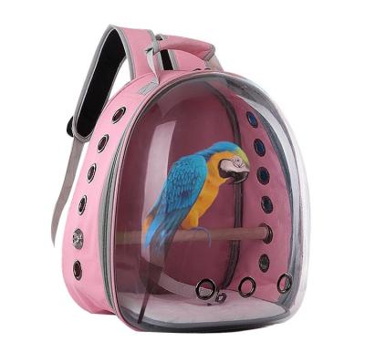 China Factory Bubble Outer Space Parrot Carrier Stocked Breathable Transparent Backpack With Pepper Perch Bird Wooden Travel Bag for sale