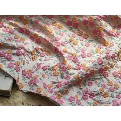 China Small waterproof fancy polyester floral embossing brocade yarn dyed jacquard fabric with many colors for sale