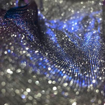 China Memory two tone color reflective moonlight bonded metallic lurex mesh fabric with glitter for women dress for sale