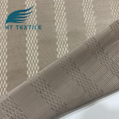 China Custom China factory polyester hole jacquard memory mesh warp knitting fabric for garments for sale