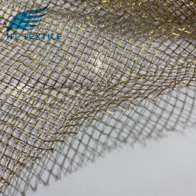 China Gold wholesale lurex memory polyester mesh decoration metallic fabric for fashion dress for sale