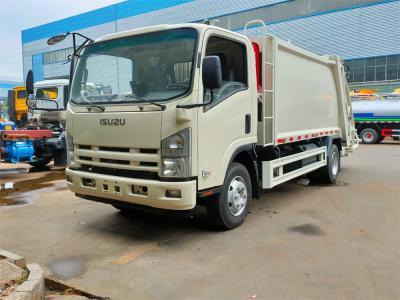 China 4x2 Japanse ISUZU NPR KV600 vuilniscompakte vrachtwagen met 6 cbm tot 8 cbm volume Te koop