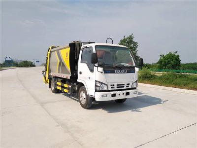 China 4x2 ISUZU 600P 6000 LITERS Linkshandige bestuurder vuilniswagen Te koop