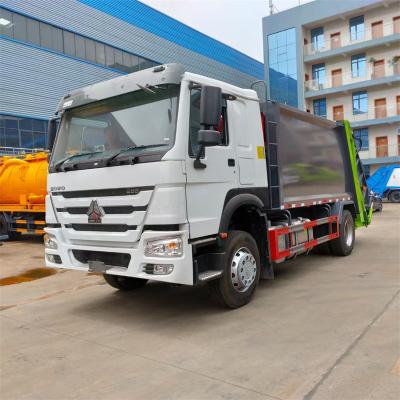 China 4X2 HOWO 18000 LITERS TRUCK WASTE COMPACTOR COMPRESSION GARBAGE TRUCK for sale