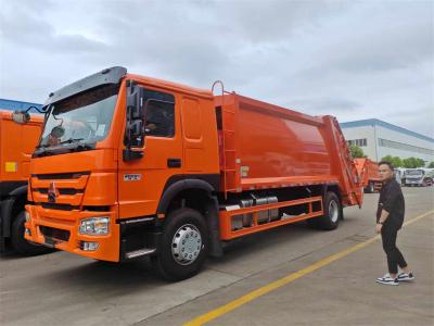 China 4x2 Sinotruck howo afvalcompressor vrachtwagen met 10 cbm tot 12 cbm volume Te koop