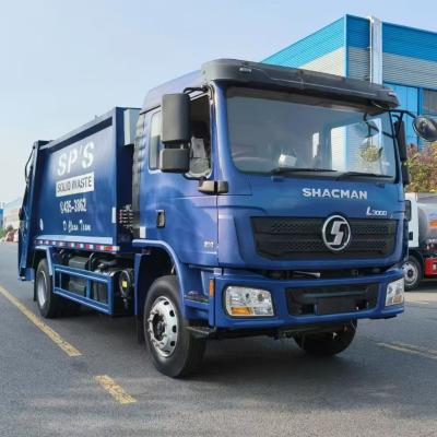 China Direito de direção SHACMAN L3000 caminhão de lixo 15m3 compactador de lixo à venda