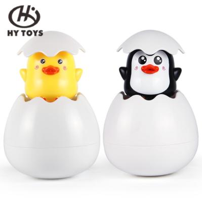 China Cute Funny Bath Toy Water Growing Egg Bath Toys Jump Float Penguin Duck Bath Toys Water Spray Egg Bath Toy for sale