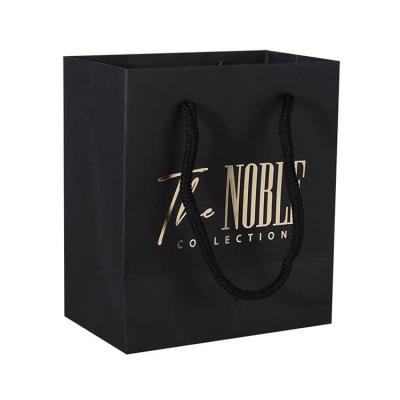 China Wholesale Recyclable Christmas Gift Printed To Handle Success Black Luxury Cheap Price Amazon Custom Shopping Paper Bag With Logo for sale