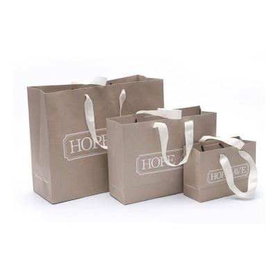 China Large Recyclable Printed Stand Up Custom Brown Craft Paper Bag With Handle for sale