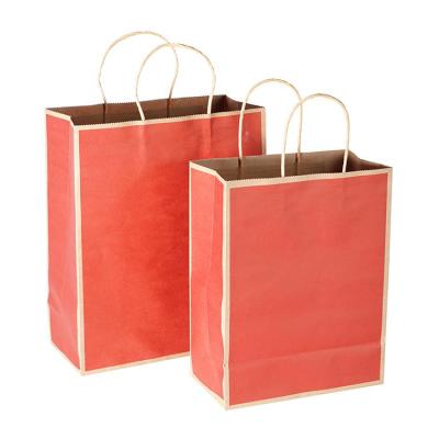 China Customized Recyclable Brown Kraft Paper Shopping Handle Bags For Clothing Store for sale