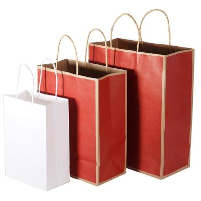 China Customized Recyclable Brown Kraft Paper Shopping Handle Bags For Clothing Store for sale