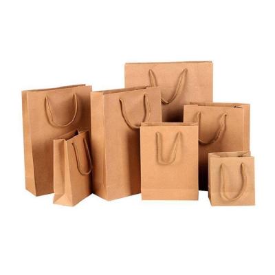 China Recyclable Brown Kraft Paper Printing Custom Shopping Paper Bags With Logos for sale