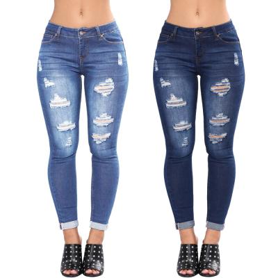 China A new hot-selling slim fit spring 2021 QUICK DRY drop-shipping women's jeans with holes in the hips and feet for sale